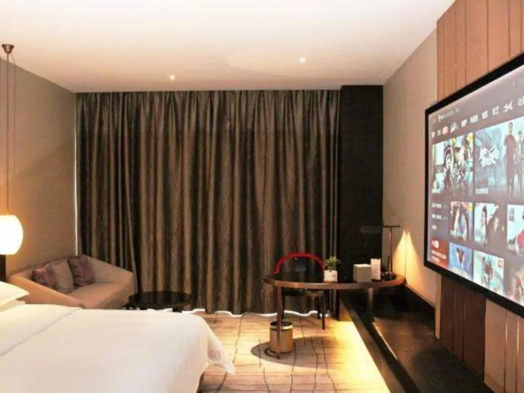 Bed in DongGuan JOYC Hotel 