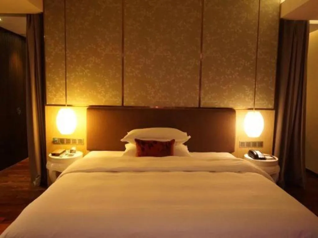 Bed in DongGuan JOYC Hotel 