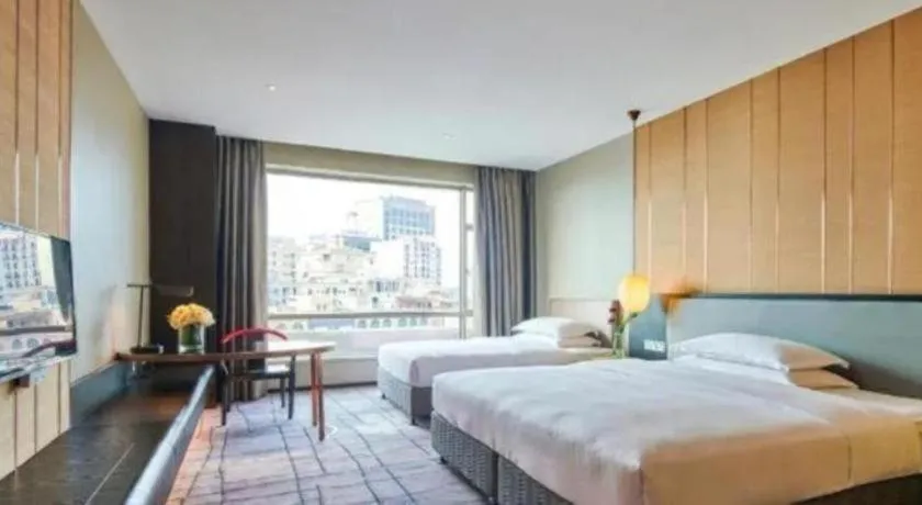 Bed in DongGuan JOYC Hotel 