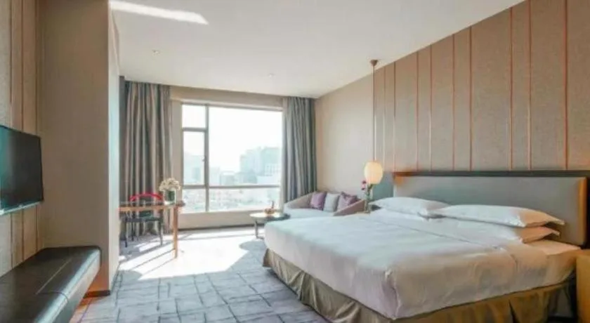 Bed in DongGuan JOYC Hotel 