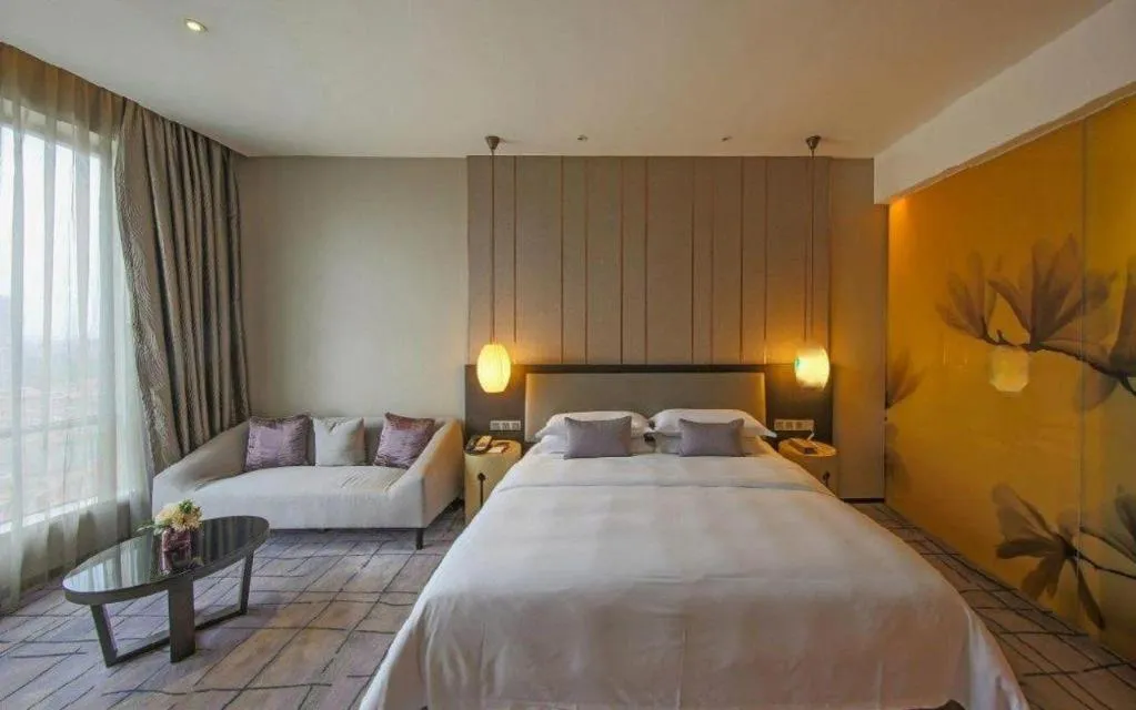 Bed in DongGuan JOYC Hotel 