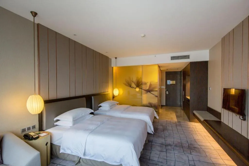 Bed in DongGuan JOYC Hotel 