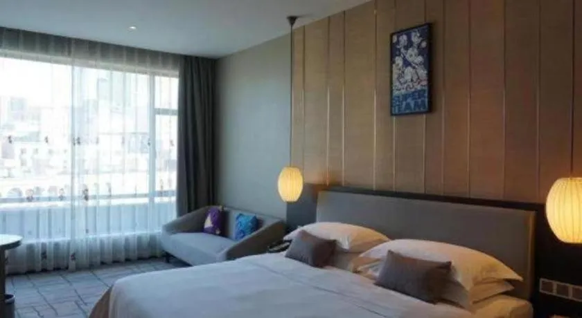 Bed in DongGuan JOYC Hotel 