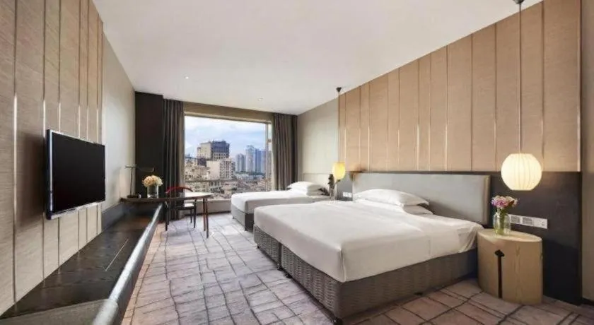 Bed in DongGuan JOYC Hotel 