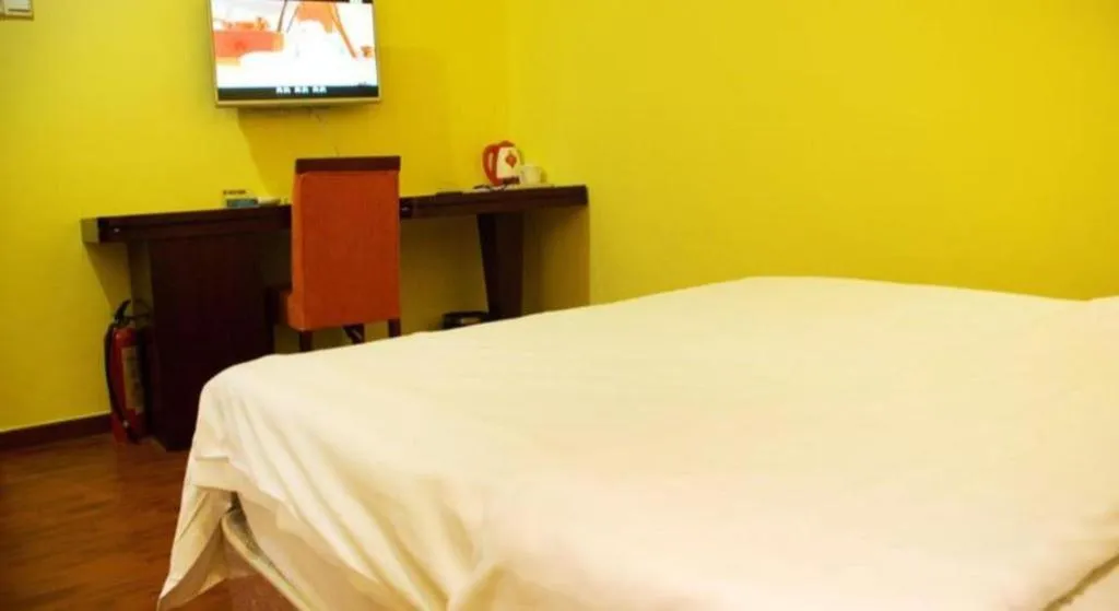 Bed in Eurasia International Hotel