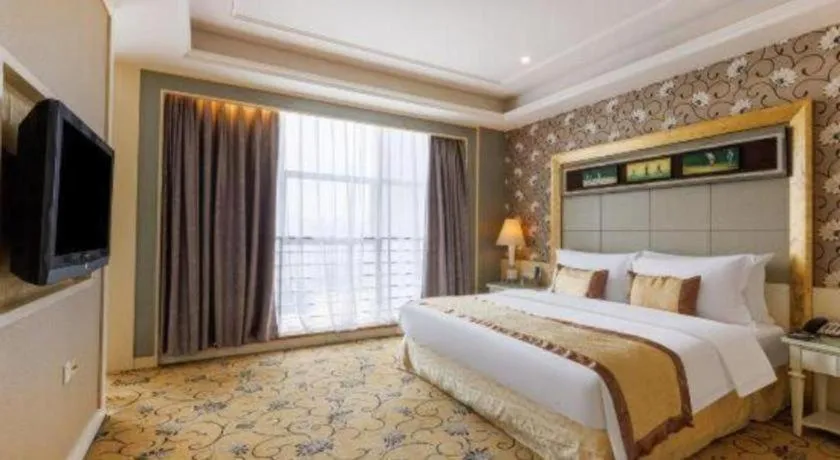 Bed in Eurasia International Hotel