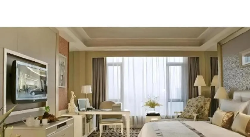 Bed in Eurasia International Hotel