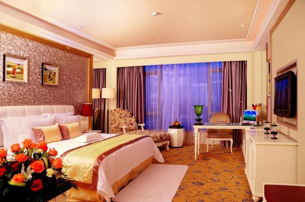 Bed in Eurasia International Hotel