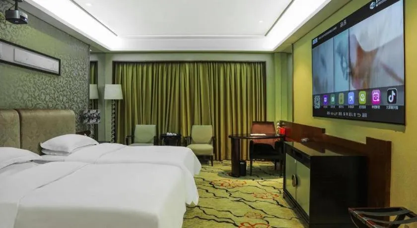 Bed in Eurasia International Hotel