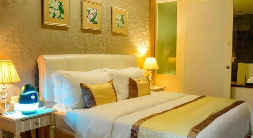 Bed in Eurasia International Hotel