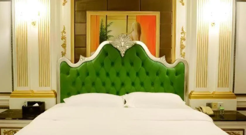 Bed in Eurasia International Hotel