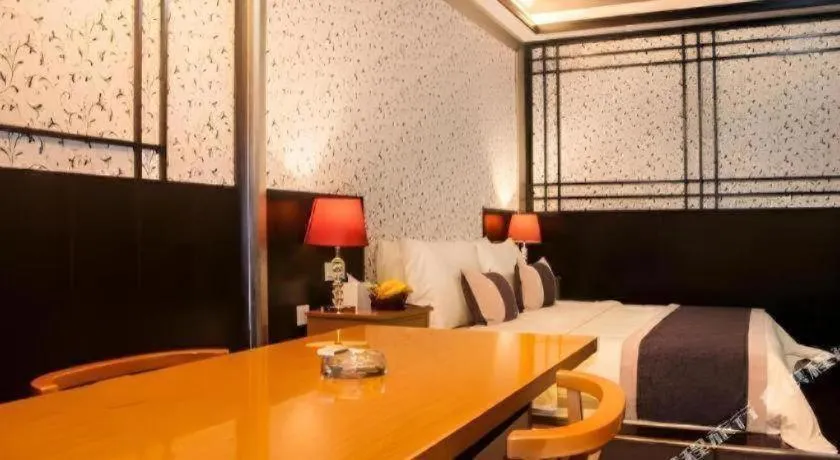 Bed in Eurasia International Hotel