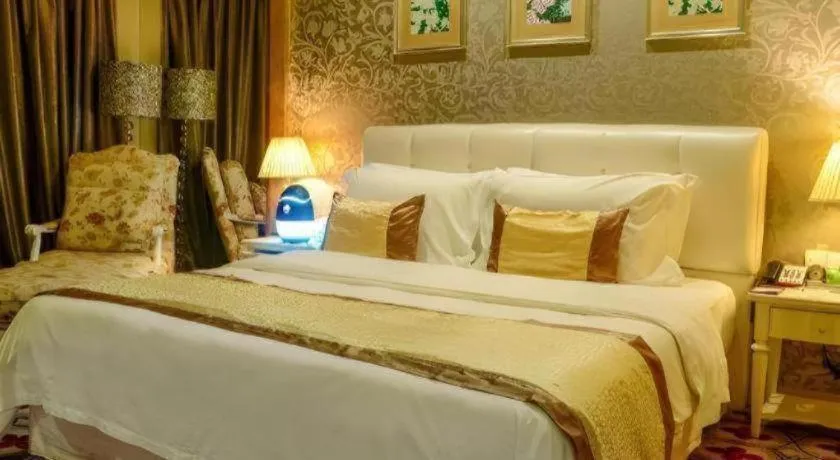 Bed in Eurasia International Hotel