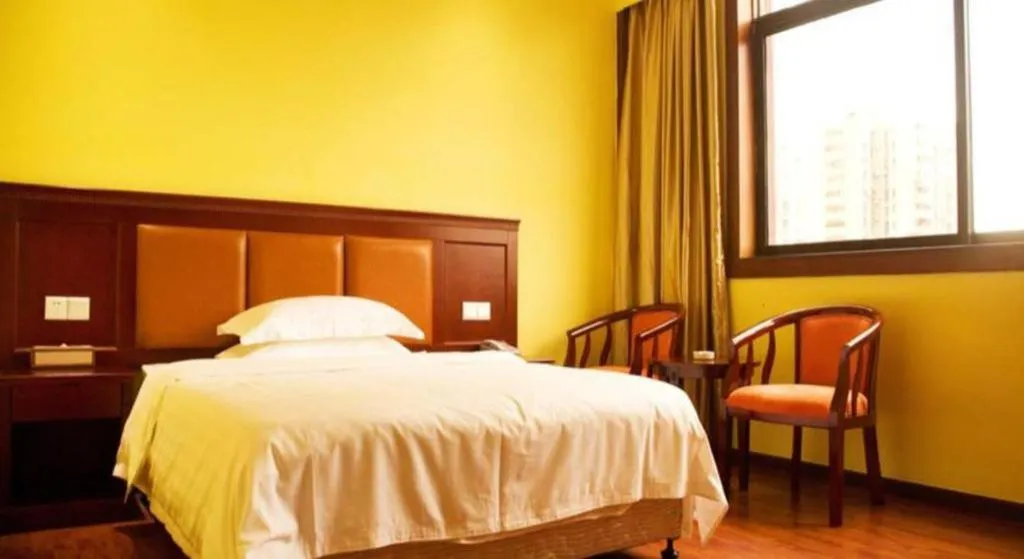 Bed in Eurasia International Hotel