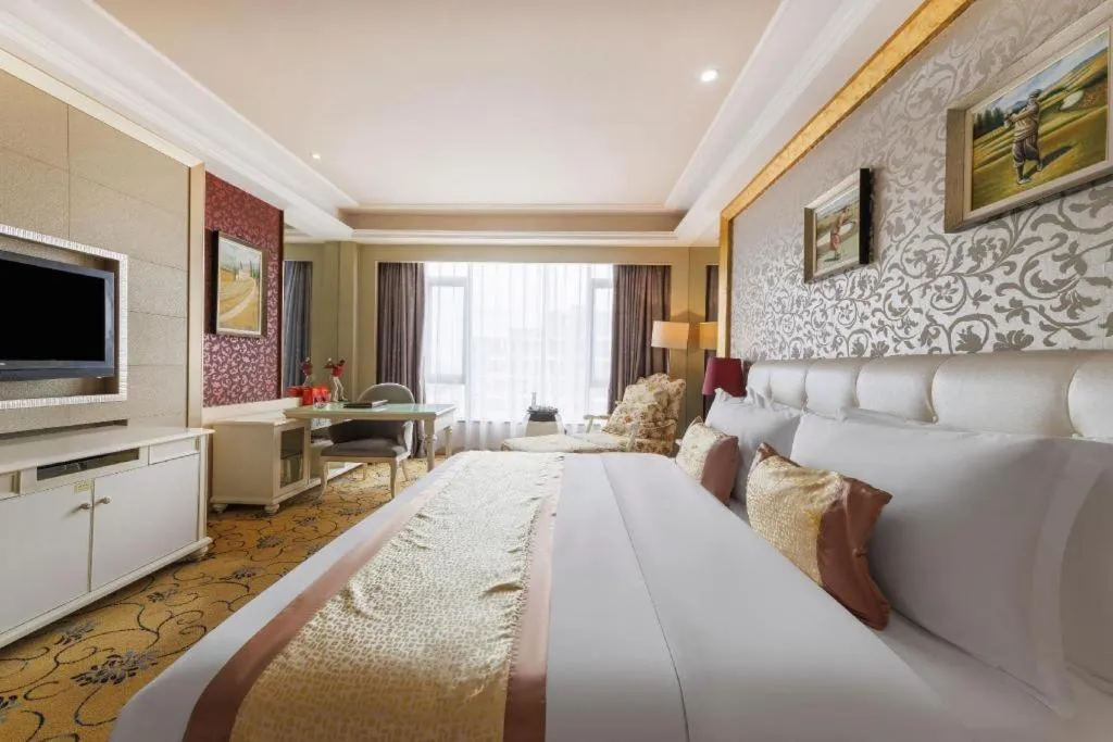 Bed in Eurasia International Hotel