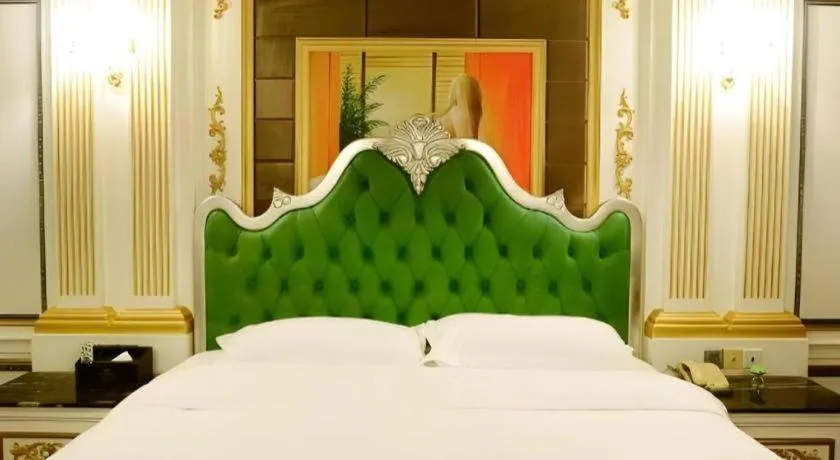 Bed in Eurasia International Hotel