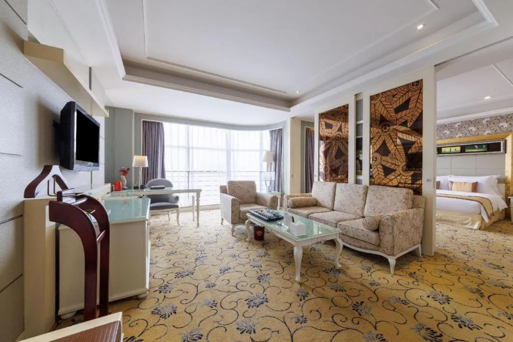 Bed in Eurasia International Hotel