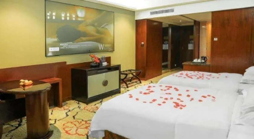 Bed in Eurasia International Hotel