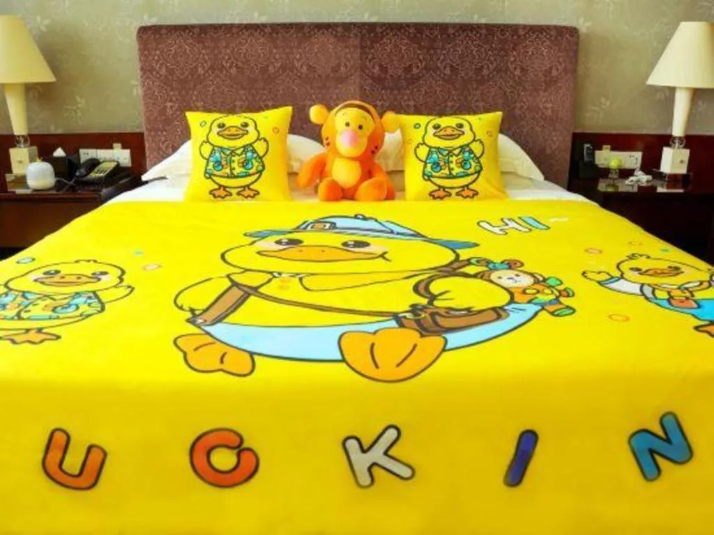 Bed in Eurasia International Hotel