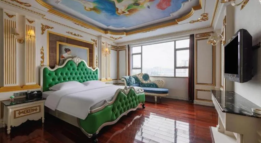 Bed in Eurasia International Hotel