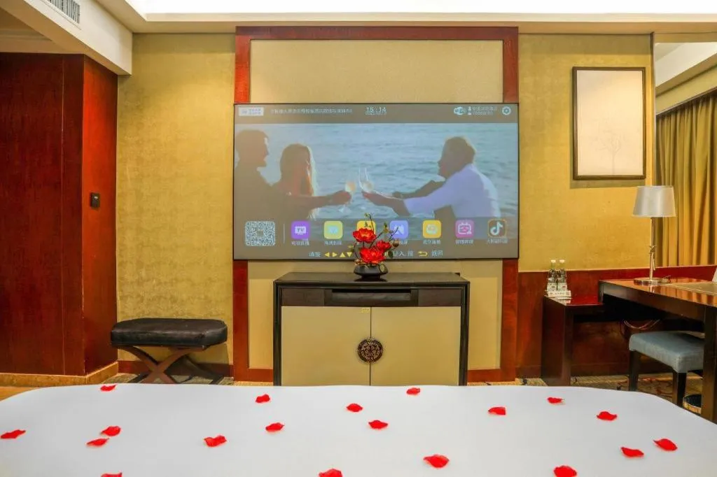 Bed in Eurasia International Hotel