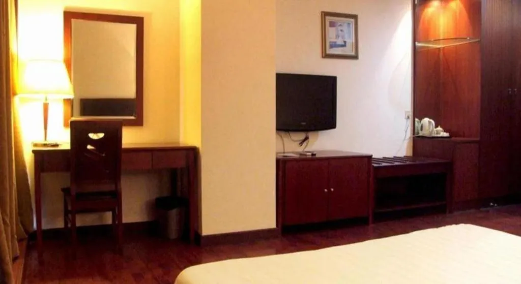 Bed in Eurasia International Hotel