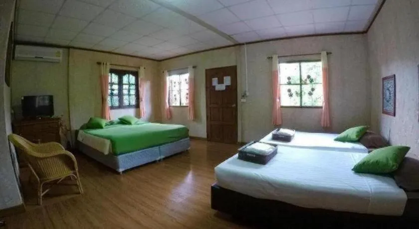 Bed in Chiangsan Goldenland Resort