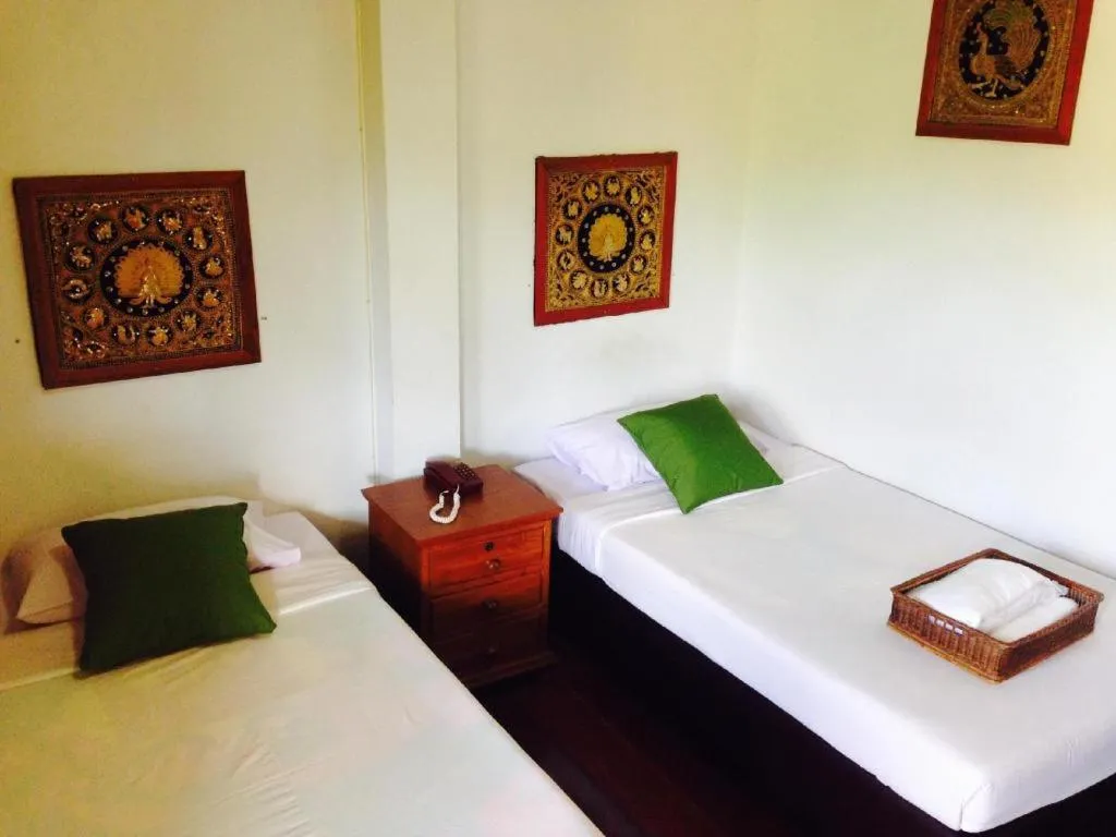 Bed in Chiangsan Goldenland Resort