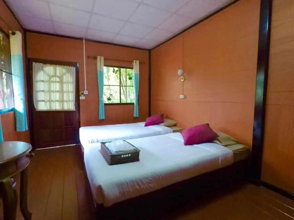 Bed in Chiangsan Goldenland Resort