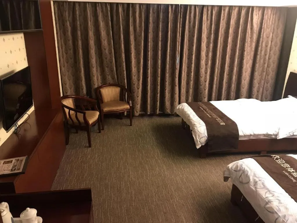 Bed in Renhe Good East Hotel