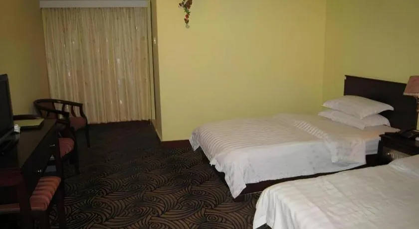 Bed in Renhe Good East Hotel