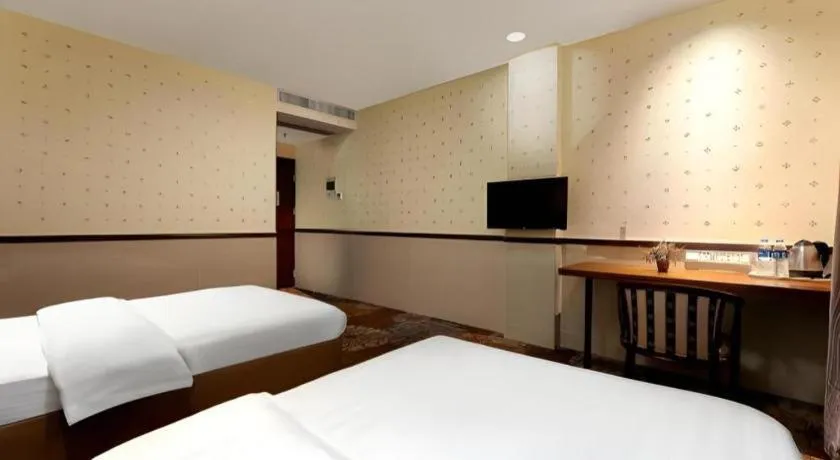 Bed in Renhe Good East Hotel