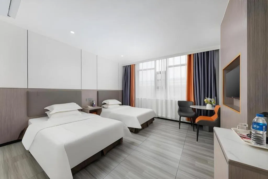 Bed in Renhe Good East Hotel