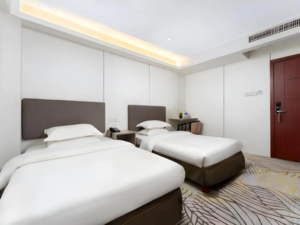 Bed in Renhe Good East Hotel