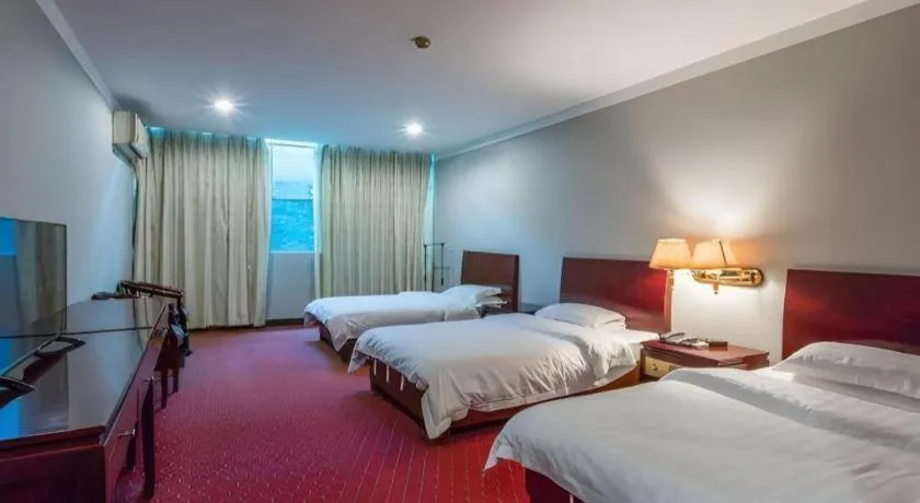 Bed in Renhe Good East Hotel