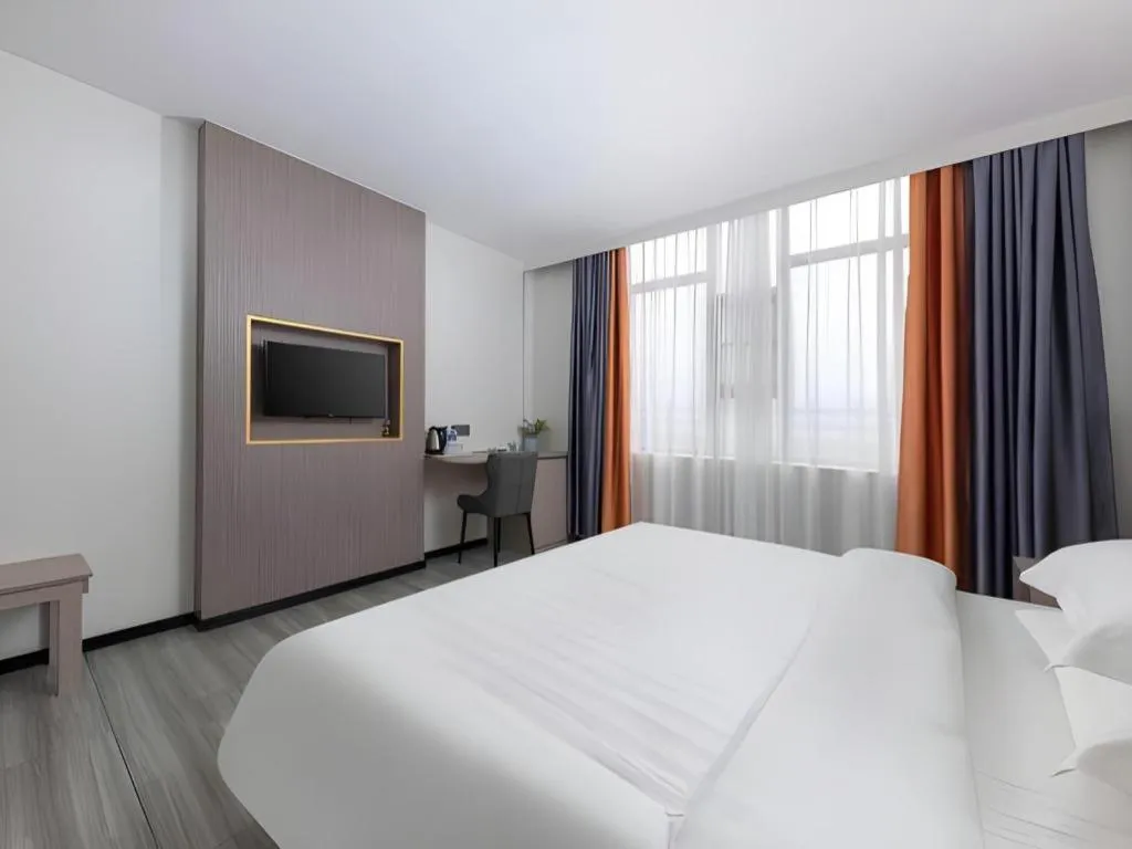 Bed in Renhe Good East Hotel