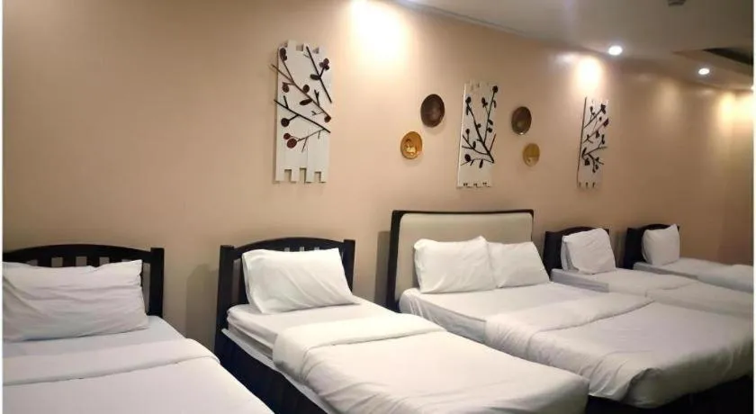 Bed in NYC Manhattan Suites