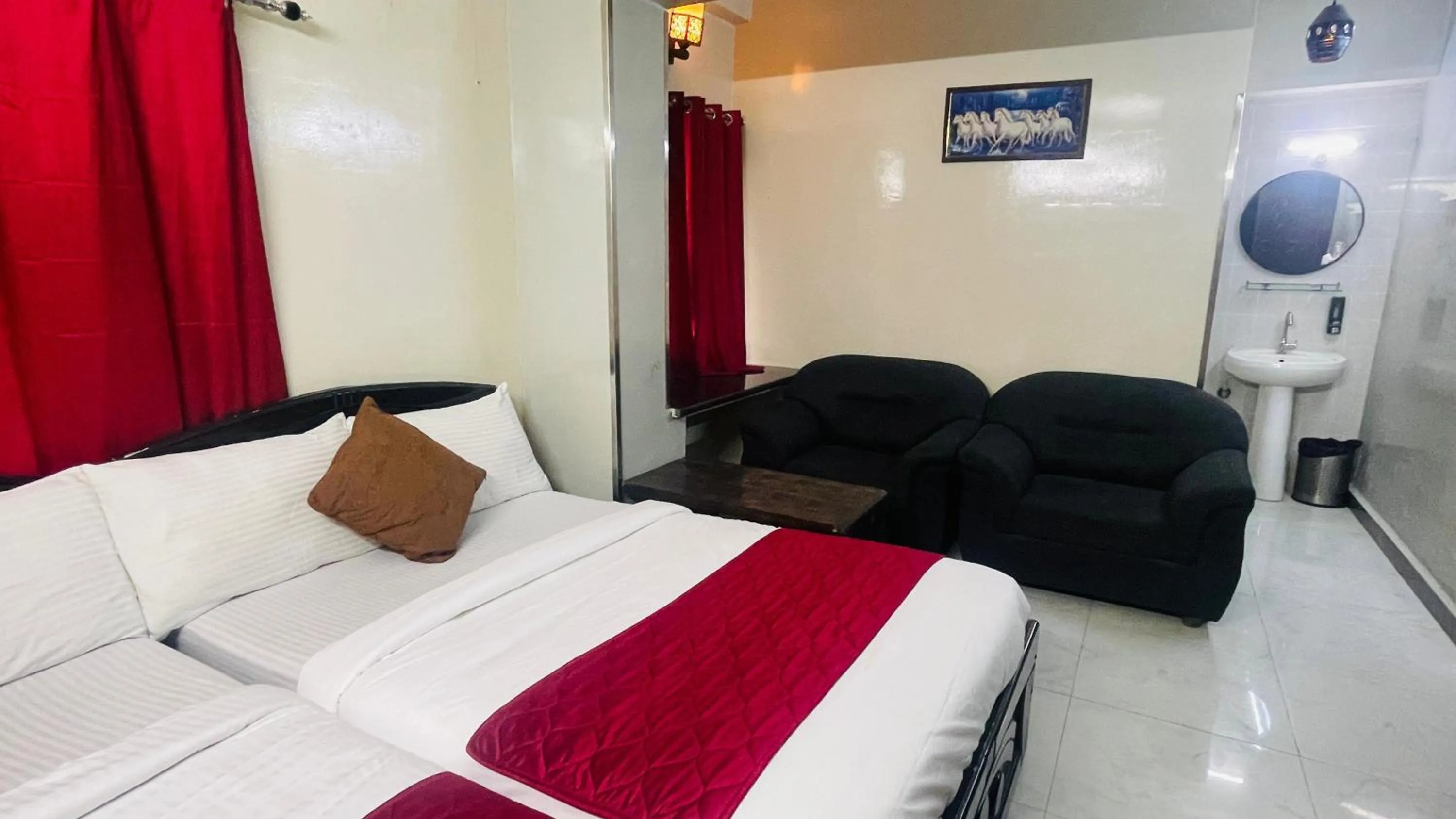 Bed in Hotel Sai Palace Inn