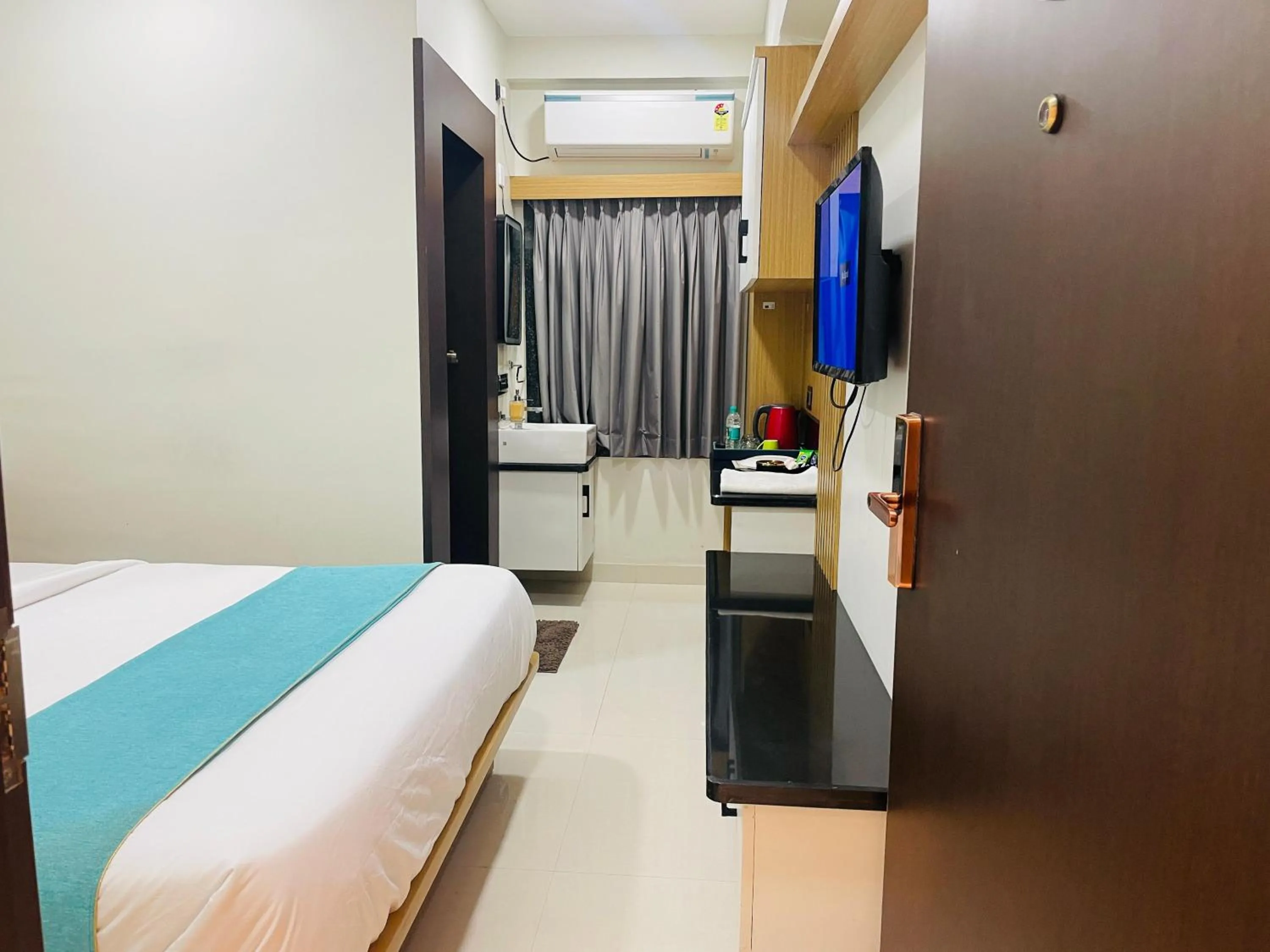 Bed in Hotel Sai Palace Inn