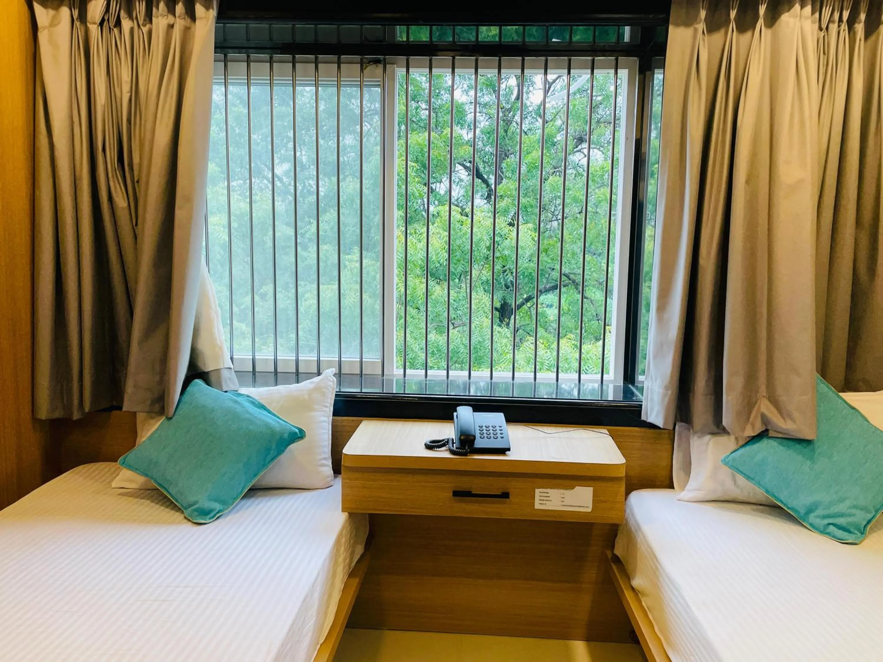 Bed in Hotel Sai Palace Inn