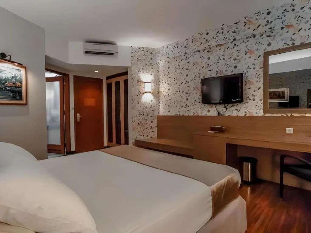 Bed in KLUB BUNGA THEME PARK HOTEL
