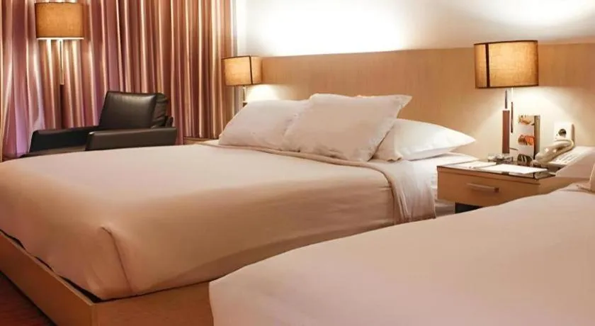 Bed in KLUB BUNGA THEME PARK HOTEL