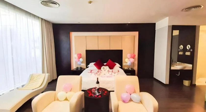 Bed in Guangdong Nanmei Osotto Hotel