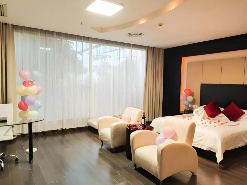 Bed in Guangdong Nanmei Osotto Hotel