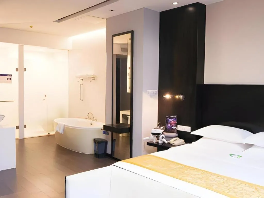 Bed in Guangdong Nanmei Osotto Hotel