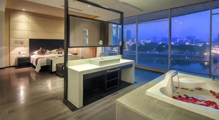 Bed in Guangdong Nanmei Osotto Hotel