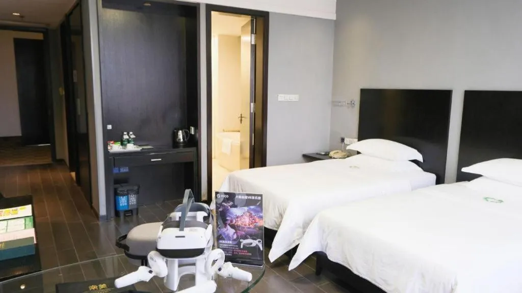 Bed in Guangdong Nanmei Osotto Hotel