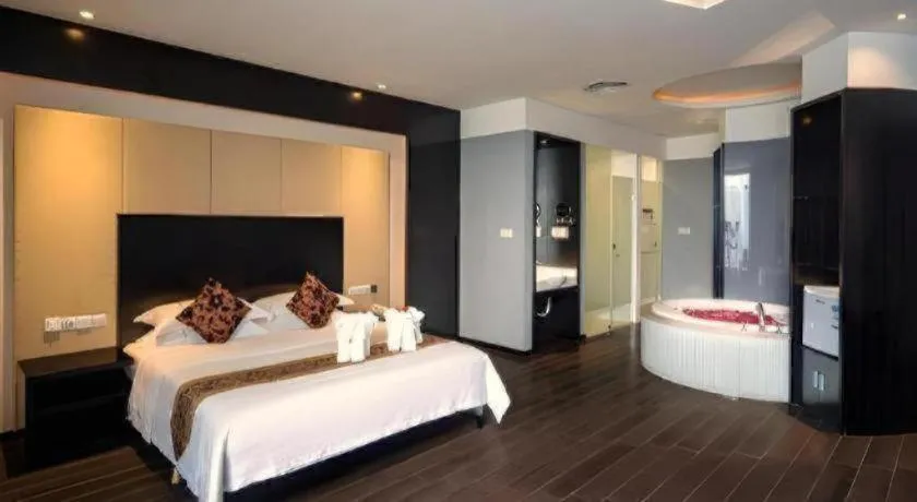 Bed in Guangdong Nanmei Osotto Hotel