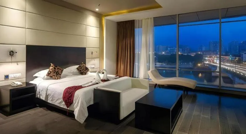 Bed in Guangdong Nanmei Osotto Hotel