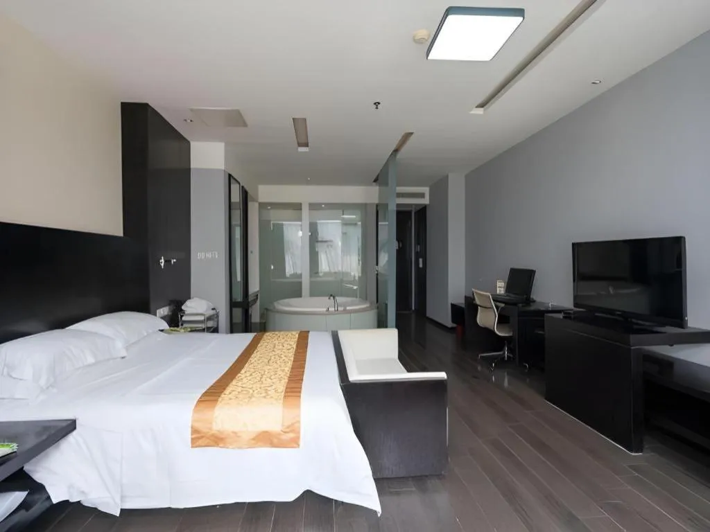 Bed in Guangdong Nanmei Osotto Hotel